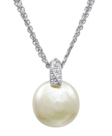 Singularly spectacular. One white man-made pearl (18 mm) stuns in this three-chain necklace by Majorica. Sterling silver setting shines with sweeping cubic zirconia accents. Approximate length: 18 inches. Approximate drop: 3/4 inch.