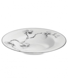 Compose a striking arrangement with the Black Orchid rim soup bowl by Michael Aram. Fine white Limoges porcelain flourishes under a dark watercolor motif inspired by foliage from around the world. Compose a striking arrangement with the Black Orchid rim soup bowl by Michael Aram. Fine white Limoges porcelain flourishes under a dark watercolor motif inspired by foliage from around the world.