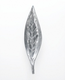 Serve bite-sized appetizers, snacks and desserts in natural splendor with this sleek, aluminum Leaf boat bowl. With a realistic texture and stem to evoke life outside your window. Serve bite-sized appetizers, snacks and desserts in natural splendor with this sleek, aluminum Leaf boat bowl. With a realistic texture and stem to evoke life outside your window.