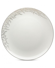Fringed with shimmering leaves of platinum and mica, this bone china charger plate turns your table into a springtime utopia. Its sleek coupe shape is a vision of modern elegance in platinum-banded white. Fringed with shimmering leaves of platinum and mica, this bone china charger plate turns your table into a springtime utopia. Its sleek coupe shape is a vision of modern elegance in platinum-banded white.
