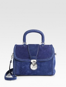 Suede bag with top handle and flap closure.Top handle, 4 dropDetachable shoulder strap, 16½ dropPush-lock flap closure with zipperOne inside zip pocketTwo inside open pocketsSatin lining10½W X 8½H X 5½DMade in Italy Suede bag with top handle and flap closure.Top handle, 4 dropDetachable shoulder strap, 16½ dropPush-lock flap closure with zipperOne inside zip pocketTwo inside open pocketsSatin lining10½W X 8½H X 5½DMade in Italy