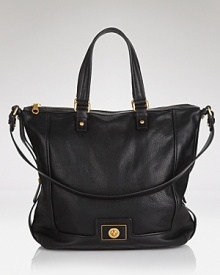 Bring daytime style to new, luxurious, heights with this leather tote from MARC BY MARC JACOBS. It's an effortless over-the-shoulder style, that plays off the label's citified edge. Bring daytime style to new, luxurious, heights with this leather tote from MARC BY MARC JACOBS. It's an effortless over-the-shoulder style, that plays off the label's citified edge.