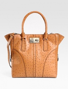 Gorgeous ostrich-stamped leather in a roomy top-handle carryall, perfectly sized to take you from work to weekend.Double top handles, 7 dropDetachable shoulder strap, 19 dropTop turnlock closureOne outside open pocketExpandable zip gussetsOne inside zip pocketTwo inside open pocketsFaille lining12½W X 13½H X 2¼DImported Gorgeous ostrich-stamped leather in a roomy top-handle carryall, perfectly sized to take you from work to weekend.Double top handles, 7 dropDetachable shoulder strap, 19 dropTop turnlock closureOne outside open pocketExpandable zip gussetsOne inside zip pocketTwo inside open pocketsFaille lining12½W X 13½H X 2¼DImported