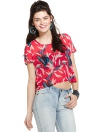 An assembly of dark bows overlay an open back on this crop top from Material Girl that's cool on the flip side, too! An assembly of dark bows overlay an open back on this crop top from Material Girl that's cool on the flip side, too!