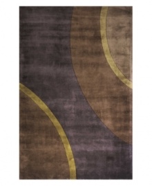 Vivid tones of plum-purple and gold shape the charming style of this alluring New Wave rug. Hand-tufted Chinese wool provides an exceptionally soft feel, while a hand-carved finish adds extra depth and lustrous shine. Inspired by twentieth-century decorative arts, the rug boasts a distinctive modern look with a truly whimsical character.