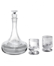 Nambe's new Groove. This brilliant, solid crystal decanter refracts light and stays put on a heavy base built for stability while a grooved stopper echoes the shape of coordinating double old-fashioned glasses. Bold, masculine and perfectly at home in modern decor. Nambe's new Groove. This brilliant, solid crystal decanter refracts light and stays put on a heavy base built for stability while a grooved stopper echoes the shape of coordinating double old-fashioned glasses. Bold, masculine and perfectly at home in modern decor.