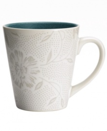 A fresh twist on a Noritake favorite, the Colorwave Turquoise Bloom mug offers the same sleek style and durability as the original dinnerware pattern but with a pretty floral print. A fresh twist on a Noritake favorite, the Colorwave Turquoise Bloom mug offers the same sleek style and durability as the original dinnerware pattern but with a pretty floral print.