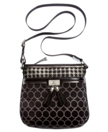 Add some signature style to your everyday accessorizing with this logo pattern crossbody from Nine West. Outfitted with the iconic 9s monogram, chic silvertone hardware and tassel accents, this dreamy design makes any ensemble a bit more heavenly. Add some signature style to your everyday accessorizing with this logo pattern crossbody from Nine West. Outfitted with the iconic 9s monogram, chic silvertone hardware and tassel accents, this dreamy design makes any ensemble a bit more heavenly.