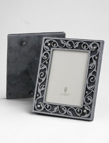 A stunning gift or keepsake made only for the most treasured photographs, crusted with faceted Swarovski crystals and freshwater pearls. Arrives in a gift box Accommodates a 8 X 10 photograph Overall: 10½ X 12½ Imported A stunning gift or keepsake made only for the most treasured photographs, crusted with faceted Swarovski crystals and freshwater pearls. Arrives in a gift box Accommodates a 8 X 10 photograph Overall: 10½ X 12½ Imported