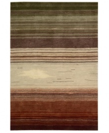 Variegated stripes of earthy tones into warm reds creates a design as artistically moving as it is functional. Hand tufted of long polyester fibers for added strength and softness, the Contour area rug from Nourison creates an ideal accent for any modern room. Variegated stripes of earthy tones into warm reds creates a design as artistically moving as it is functional. Hand tufted of long polyester fibers for added strength and softness, the Contour area rug from Nourison creates an ideal accent for any modern room.