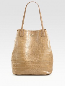 Luxurious crocodile embossed leather accented with a logo emblem; perfect for all your daily essentials.Double top handles, 9 dropMagnetic snap closure with center buckle strapOne inside zip pocketTwo inside open pocketsCotton lining12½W X 14H X 7DImported Luxurious crocodile embossed leather accented with a logo emblem; perfect for all your daily essentials.Double top handles, 9 dropMagnetic snap closure with center buckle strapOne inside zip pocketTwo inside open pocketsCotton lining12½W X 14H X 7DImported