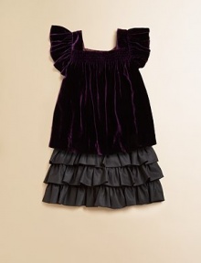 A lush velvet top is smocked along the neckline and features short flutter sleeves for a playful accent.Smocked square necklineShort flutter sleeves82% viscose/18% silkDry cleanImported A lush velvet top is smocked along the neckline and features short flutter sleeves for a playful accent.Smocked square necklineShort flutter sleeves82% viscose/18% silkDry cleanImported