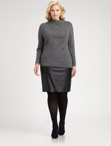 Soft Italian wool adds a luxurious feel to this intriguing turtleneck. Its well-placed front seam will complement your midsection.Unique turtleneckLong sleevesDropped shouldersPull-on styleAbout 28 from shoulder to hemWoolHand washImported of Italian fabric