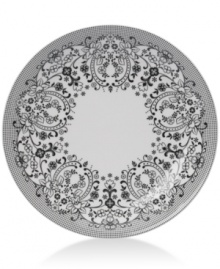 Oleg Cassini weaves a table of playful sophistication with the round Ava platter, featuring lacy flowers and dots in timeless black and white. Oleg Cassini weaves a table of playful sophistication with the round Ava platter, featuring lacy flowers and dots in timeless black and white.
