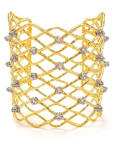 Take a detailed approach with this piece of woven wrist wear from Alexis Bittar. This statement cuff is crafted from gold plate with inset crystal studs for an added edge. Take a detailed approach with this piece of woven wrist wear from Alexis Bittar. This statement cuff is crafted from gold plate with inset crystal studs for an added edge.