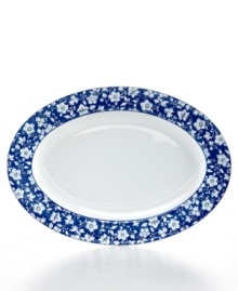 A classic beauty, the Blue Meadow oval platter features delicate blooms rooted in fuss-free Pfaltzgraff stoneware. Crisp blue highlights in pure white refresh country settings with effortless elegance. A classic beauty, the Blue Meadow oval platter features delicate blooms rooted in fuss-free Pfaltzgraff stoneware. Crisp blue highlights in pure white refresh country settings with effortless elegance.