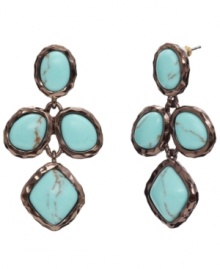 Inspire your look with a little bohemian beauty. Monet's chic drop earrings combine a rich bronze tone mixed metal setting with bright reconstituted turquoise stones. Approximate drop: 1-3/4 inches.