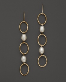 Freshwater pearls add rich luster to links of 14K yellow gold. By Nancy B. Freshwater pearls add rich luster to links of 14K yellow gold. By Nancy B.