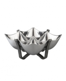 Set or simply decorate the table with the ultra-modern Anvil condiment bowl from Nambe's collection of serveware and serving dishes. A sculptural, iron-finished base cradles contoured silvertone alloy in this innovative Neil Cohen design. Set or simply decorate the table with the ultra-modern Anvil condiment bowl from Nambe's collection of serveware and serving dishes. A sculptural, iron-finished base cradles contoured silvertone alloy in this innovative Neil Cohen design.