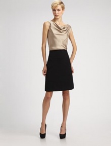 A polished woven design tailored with a hint of stretch for a perfect fit.Smooth front Side zipper Back waist pleats Inverted back pleat at hem About 22 long 97% polyester/3% spandex Dry clean Imported A polished woven design tailored with a hint of stretch for a perfect fit.Smooth front Side zipper Back waist pleats Inverted back pleat at hem About 22 long 97% polyester/3% spandex Dry clean Imported