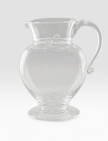 A simply stunning glass pitcher marries a traditional silhouette with a spiraled sphere ground. Extraordinary thread and berry detail creates all the interest and charm of an heirloom classic. 76 oz. capacity 9½H X 7½ diam. Dishwasher safe Imported A simply stunning glass pitcher marries a traditional silhouette with a spiraled sphere ground. Extraordinary thread and berry detail creates all the interest and charm of an heirloom classic. 76 oz. capacity 9½H X 7½ diam. Dishwasher safe Imported