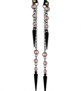 A spike in interest and appeal. This pair of linear earrings from GUESS is crafted from sprayed-jet-tone mixed metal with lavender glass pearls and spikes adding an edge. Crafted from sprayed-jet-tone mixed metal, Approximate drop: 4 inches.