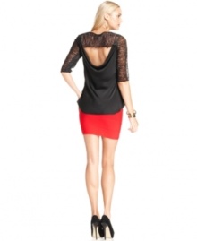 An open back and sheer lace ups the sultry quotient on this BCBGMAXAZRIA top -- perfect for hot soiree style!