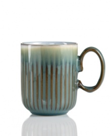 A rustic glaze, textured feel and rounded base make Denby's fluted mug a stylish go-to for cocoa, coffee and soup. Ultra-sturdy stoneware heats and reheats easily for everyday, anytime use. A rustic glaze, textured feel and rounded base make Denby's fluted mug a stylish go-to for cocoa, coffee and soup. Ultra-sturdy stoneware heats and reheats easily for everyday, anytime use.