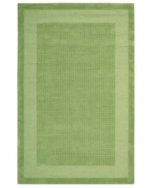 In lush lime-green, this fetching rug adds flavor to any room. A distinctive center grid gives the rug a delightful texture while coordinating well with both casual and modern interiors. Hand-tufted of wool for premium softness and durability. In lush lime-green, this fetching rug adds flavor to any room. A distinctive center grid gives the rug a delightful texture while coordinating well with both casual and modern interiors. Hand-tufted of wool for premium softness and durability.