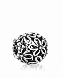 This sterling silver PANDORA charm features a feminine floral design reminiscent of a wildflower field. This sterling silver PANDORA charm features a feminine floral design reminiscent of a wildflower field.