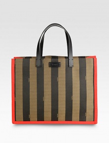 A structured design in striped canvas with contrast trim and leather accents.Double leather top handles, 5½ dropOpen topOne inside zip pouchLinen lining14¼W X 11H X 6DMade in Italy A structured design in striped canvas with contrast trim and leather accents.Double leather top handles, 5½ dropOpen topOne inside zip pouchLinen lining14¼W X 11H X 6DMade in Italy