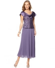 Patra's petite dress defines evening elegance with a shimmering cowlneck, sparkling beaded bodice and sweeping chiffon shirt. Patra's petite dress defines evening elegance with a shimmering cowlneck, sparkling beaded bodice and sweeping chiffon shirt.