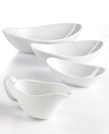This multi-purpose serving bowl does it all, transitioning smoothly from the oven or microwave and into the dishwasher in timeless white porcelain. An elliptical shape presents sides and dips with modern grace. From The Cellar's collection of serveware and serving dishes. This multi-purpose serving bowl does it all, transitioning smoothly from the oven or microwave and into the dishwasher in timeless white porcelain. An elliptical shape presents sides and dips with modern grace. From The Cellar's collection of serveware and serving dishes.
