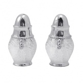 Shaped by hand of durable recycled aluminum, this striking salt-and-pepper set from Mariposa is detailed with a softly textured finish and beaded edges for a look that's at once organic and refined.