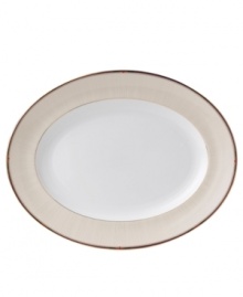 A subtle linear pattern, tiny check detail and lustrous gold banding make this Wedgwood oval platter a beautiful complement to the exotic florals of Pashmina dinnerware. In dishwasher-safe bone china for effortless elegance. A subtle linear pattern, tiny check detail and lustrous gold banding make this Wedgwood oval platter a beautiful complement to the exotic florals of Pashmina dinnerware. In dishwasher-safe bone china for effortless elegance.