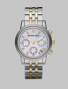 High-contrast appeal and dazzling Swarvoski crystals add interest to this technical timepiece. Quartz movementWater resistant to 10 ATMRound stainless steel case, 36.5mm (1.5) Textured bezelMother-of-pearl chronograph dialSwarvoski crystal hour markersDate display between 4 and 5 o'clockSecond hand Two-tone stainless steel link braceletImported High-contrast appeal and dazzling Swarvoski crystals add interest to this technical timepiece. Quartz movementWater resistant to 10 ATMRound stainless steel case, 36.5mm (1.5) Textured bezelMother-of-pearl chronograph dialSwarvoski crystal hour markersDate display between 4 and 5 o'clockSecond hand Two-tone stainless steel link braceletImported