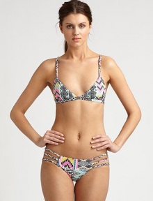 From its lively, multi-colored print to its bohemian-inspired, braided straps, this bikini has it all, including the right amount of stretch for a great fit.Braided strapsTriangle cupsBack clasp closureCriss-cross backBraided sides on stretch bottomFully lined80% nylon/20% spandexHand washMade in USA From its lively, multi-colored print to its bohemian-inspired, braided straps, this bikini has it all, including the right amount of stretch for a great fit.Braided strapsTriangle cupsBack clasp closureCriss-cross backBraided sides on stretch bottomFully lined80% nylon/20% spandexHand washMade in USA