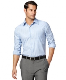 Stay smooth while looking sharp in this wrinkle free shirt by Van Heusen.