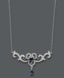 Accent your evening wear with elegance. This ornate pendant by Victoria Townsend features pear-cut sapphires (9/10 ct. t.w.) and diamond accents in a sterling silver filigree setting. Approximate length: 17 inches. Approximate pendant length: 3/4 inch. Approximate pendant width: 1-1/2 inches. Accent your evening wear with elegance. This ornate pendant by Victoria Townsend features pear-cut sapphires (9/10 ct. t.w.) and diamond accents in a sterling silver filigree setting. Approximate length: 17 inches. Approximate pendant length: 3/4 inch. Approximate pendant width: 1-1/2 inches.
