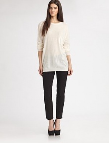 Extra-fine merino wool knit in a soft, slouchy, tunic-length pullover.RoundneckDropped shouldersRibbed trimPullover styleAbout 29 from shoulder to hemWoolDry cleanImportedModel shown is 5'9½ (176cm) wearing US size Small. Extra-fine merino wool knit in a soft, slouchy, tunic-length pullover.RoundneckDropped shouldersRibbed trimPullover styleAbout 29 from shoulder to hemWoolDry cleanImportedModel shown is 5'9½ (176cm) wearing US size Small.