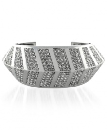 Show your daring side with this bracelet from Vince Camuto. Crafted from silver-tone mixed metal, the chevron-styled cuff glistens with crystal pave accents for an elegant touch. Approximate length: 6 inches.