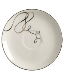 Sweet yet sophisticated, a loopy ribbon design sweeps across this porcelain tea saucer from Mikasa. Complete with a sparkling platinum rim, this flirty pattern captivates everyone at your dinner table. Sweet yet sophisticated, a loopy ribbon design sweeps across this porcelain tea saucer from Mikasa. Complete with a sparkling platinum rim, this flirty pattern captivates everyone at your dinner table.