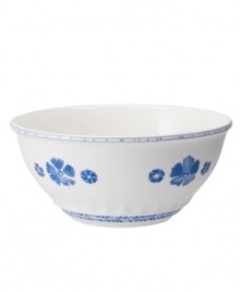 Vintage charm meets modern durability in the Farmhouse Touch vegetable bowl, featuring cornflower-blue laurels and blooms in delicately embossed porcelain from Villeroy & Boch. Vintage charm meets modern durability in the Farmhouse Touch vegetable bowl, featuring cornflower-blue laurels and blooms in delicately embossed porcelain from Villeroy & Boch.