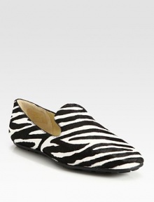 A bold zebra print freshens this simple silhouette in luxurious pony hair with fine leather trim. Zebra-print pony hair upper with leather trimLeather liningRubber solePadded insoleMade in Italy