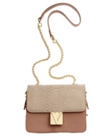 Add a socialite flair to any ensemble with the Kristen Shoulder Bag from Vince Camuto. Signature hardware, python print accents and a glossy chain embellished shoulder strap will keep your style polished and poised. Add a socialite flair to any ensemble with the Kristen Shoulder Bag from Vince Camuto. Signature hardware, python print accents and a glossy chain embellished shoulder strap will keep your style polished and poised.