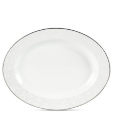 Gracefully understated, the Tanglewood oval platter by Mikasa is swept with romantic scrolling florals in pure white. A polished platinum edge refines already-elegant porcelain to enhance every occasion. Gracefully understated, the Tanglewood oval platter by Mikasa is swept with romantic scrolling florals in pure white. A polished platinum edge refines already-elegant porcelain to enhance every occasion.