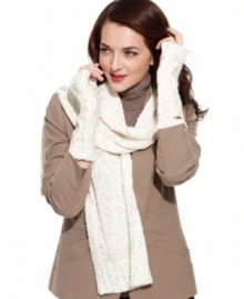 Show off your shine factor with this sequin cable knit scarf from Calvin Klein that lends a sporty-chic look to your winter wardrobe. Show off your shine factor with this sequin cable knit scarf from Calvin Klein that lends a sporty-chic look to your winter wardrobe.