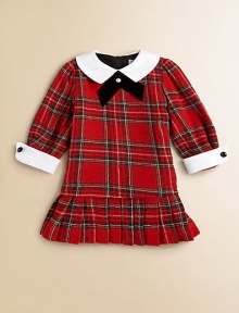 A dynamic tartan plaid print and pleated hem define this party-ready, pretty girl frock.Pointed flat collarLong sleevesBack zipperDrop-waistRuffled hemViscose/WoolDry cleanImported A dynamic tartan plaid print and pleated hem define this party-ready, pretty girl frock.Pointed flat collarLong sleevesBack zipperDrop-waistRuffled hemViscose/WoolDry cleanImported