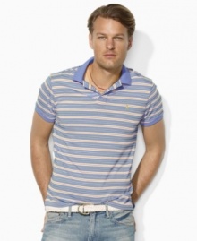 Crafted in soft lightweight cotton jersey, a relaxed-fitting short-sleeved polo shirt exudes masculine polish with a bold striped pattern. Crafted in soft lightweight cotton jersey, a relaxed-fitting short-sleeved polo shirt exudes masculine polish with a bold striped pattern.