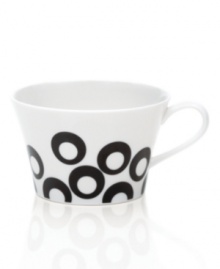 Circle 'round the table for a taste of retro fun! From Mikasa dinnerware, dishes like this white porcelain teacup feature ebony rings that bounce playfully around in a mod pattern for festive everyday meals and entertaining. (Clearance) Circle 'round the table for a taste of retro fun! From Mikasa dinnerware, dishes like this white porcelain teacup feature ebony rings that bounce playfully around in a mod pattern for festive everyday meals and entertaining. (Clearance)